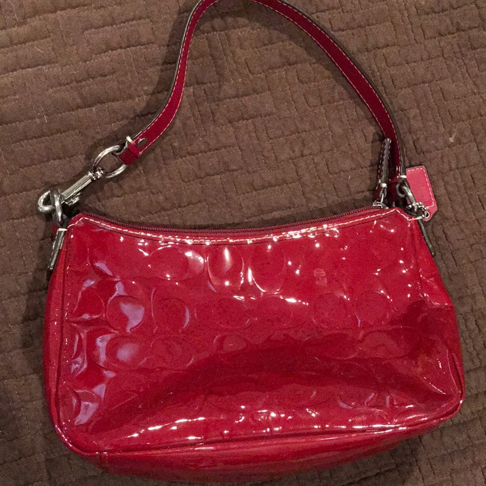 Red patent leather coach